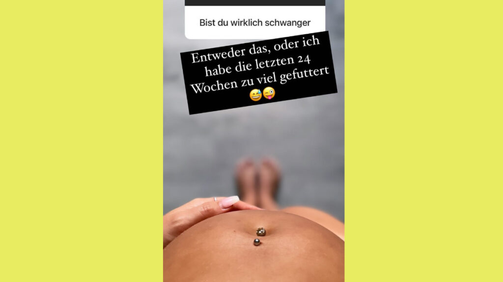 Annemarie Eilfeld zeigt ihren Babybauch.